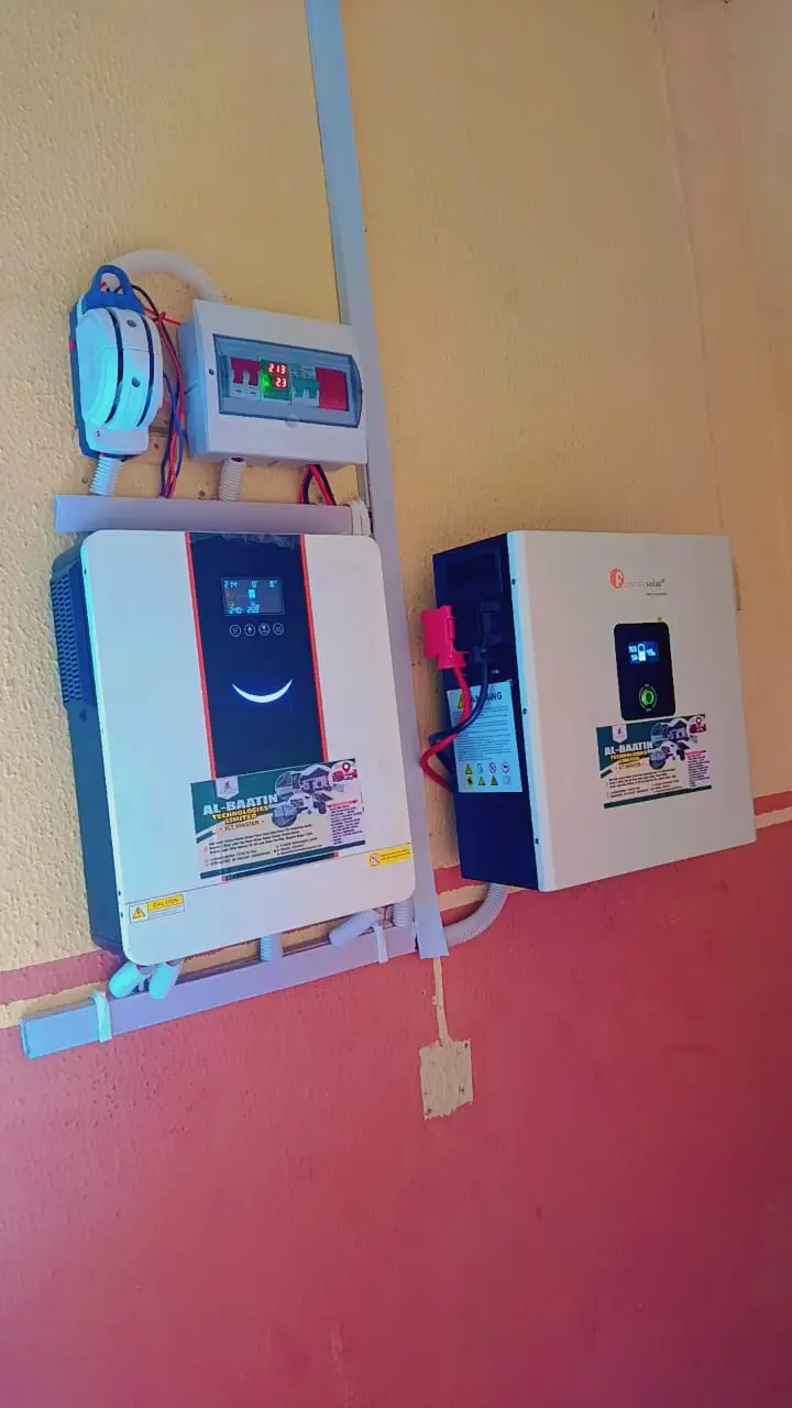 After the upgrade: a Felicity hybrid inverter and matching lithium battery unit mounted side by side on the wall, with a monitor and isolator above them.