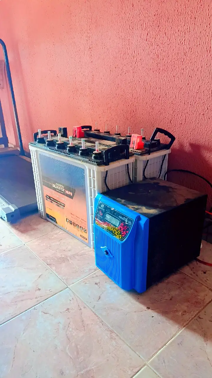Before the upgrade: the old 2kVA inverter sitting above a pair of tubular batteries.