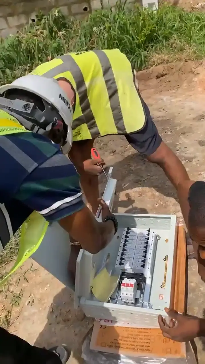 Checking over the breakers in the distribution board before installation.