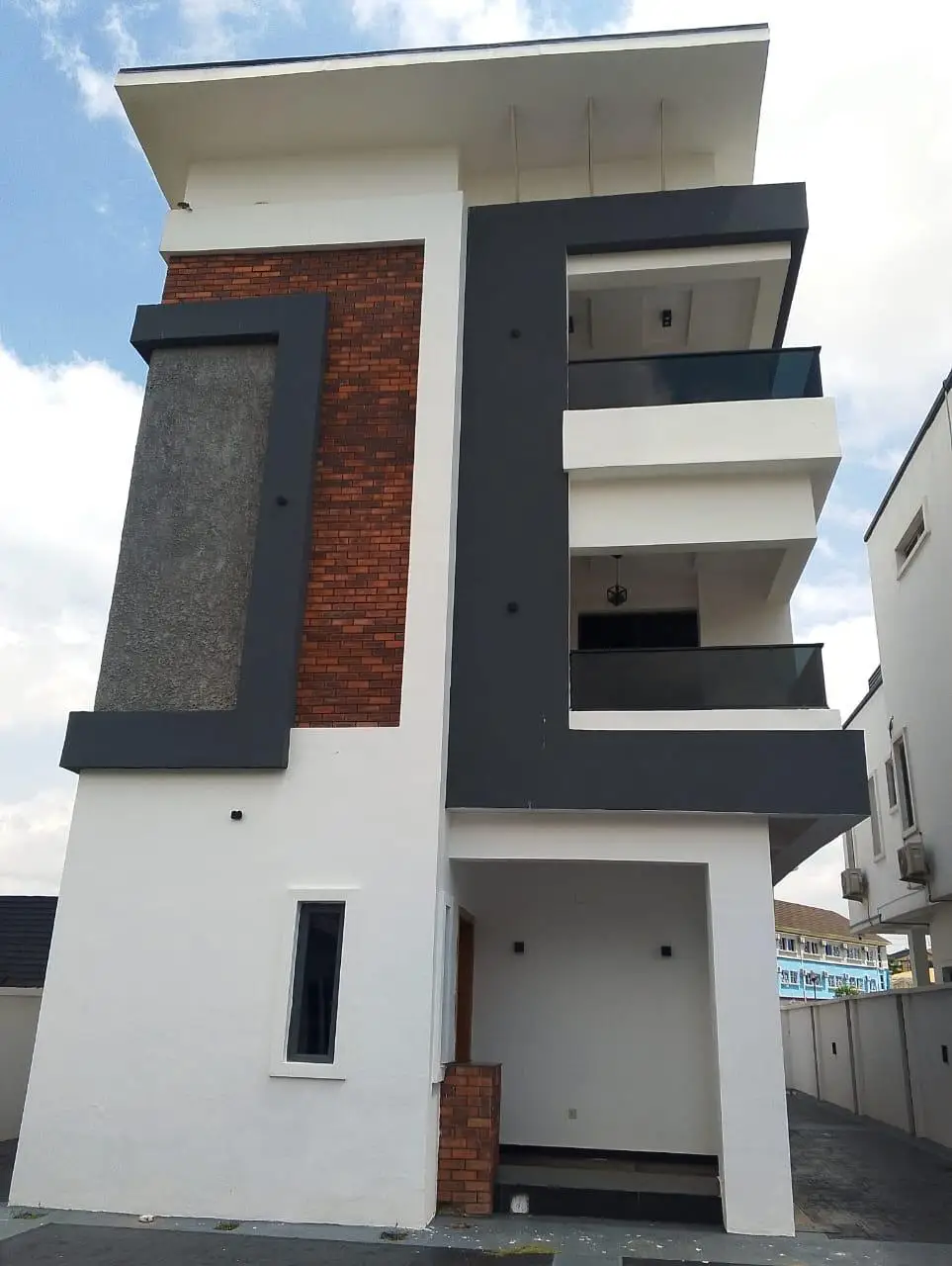 The two-storey house the system was installed on, seen from the driveway.