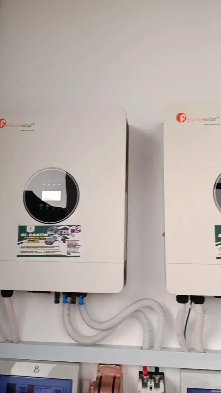 A close look along the three inverters and the breaker panels wired between them.